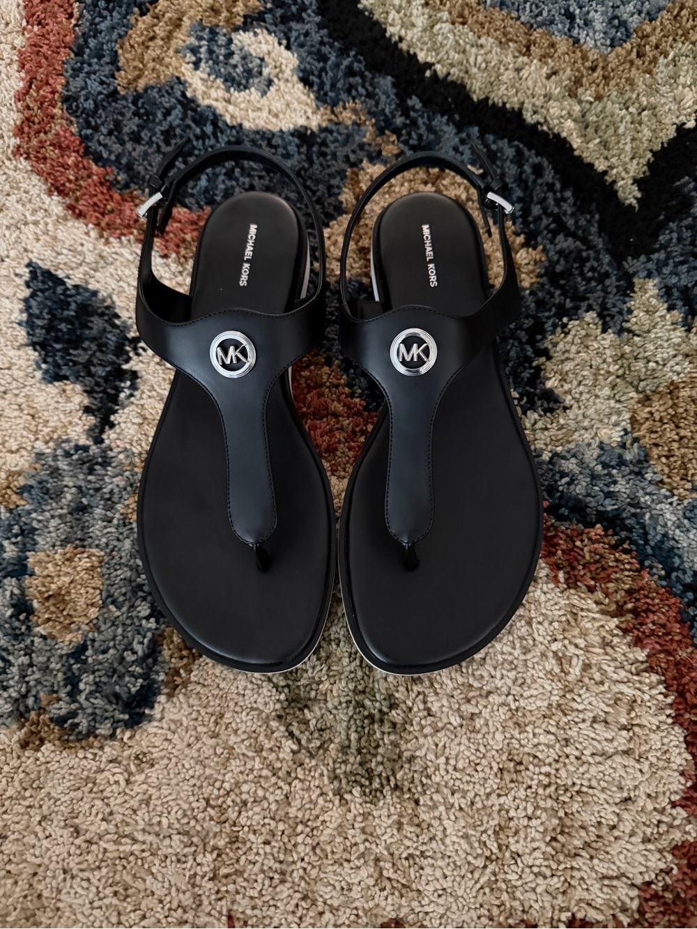 Michael Kors Black Thong Sandals with Silver MK Medallion